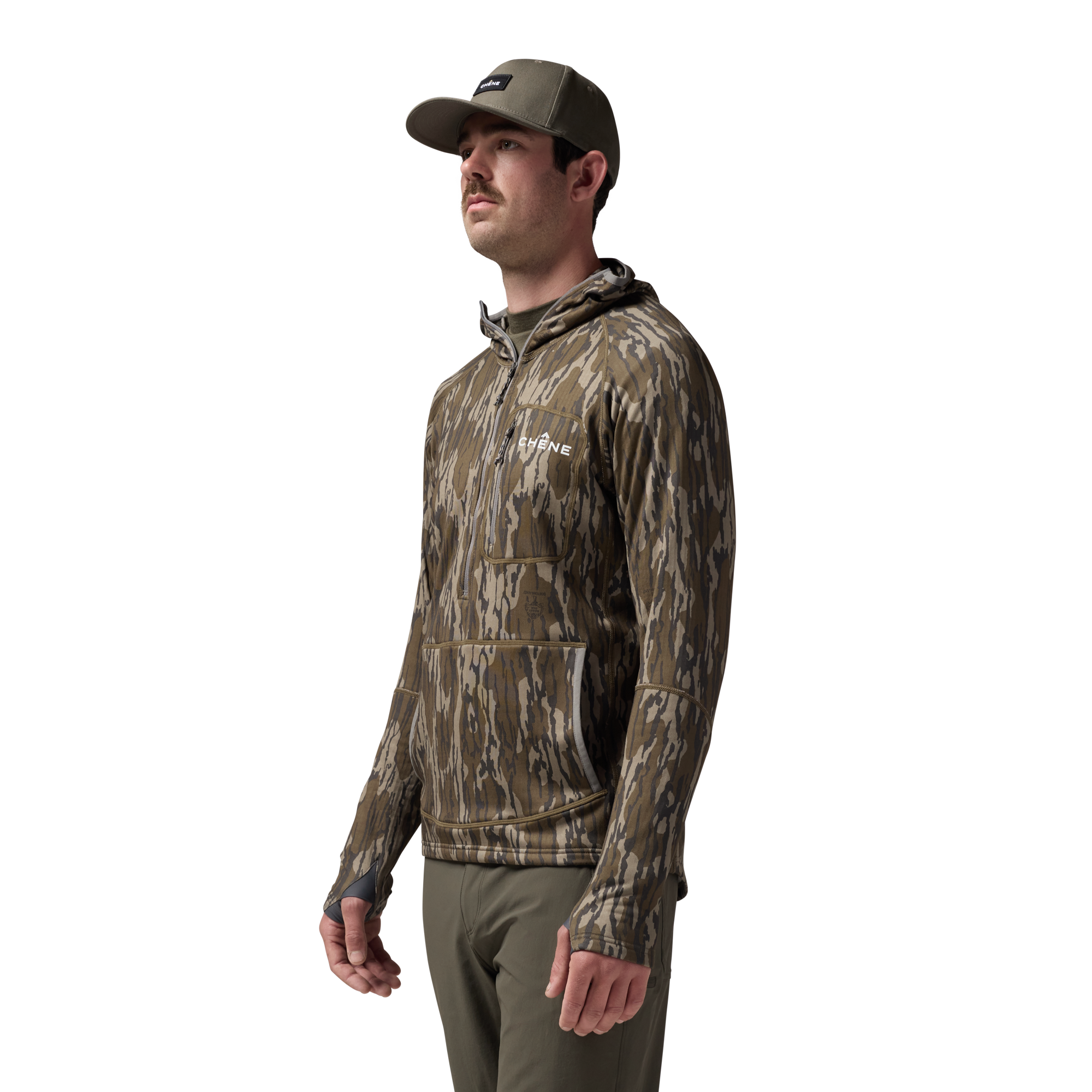 Sixty Series Technical Fleece Half Zip with Hood in Mossy Oak Original Bottomland, on model #mossy_oak_original_bottomland