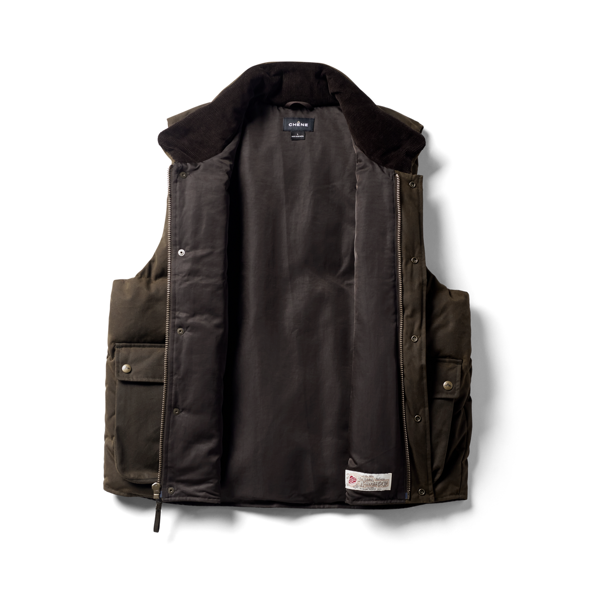 Founder's Reserve Waxed Down Vest in Dark Olive, flat lay #dark_olive