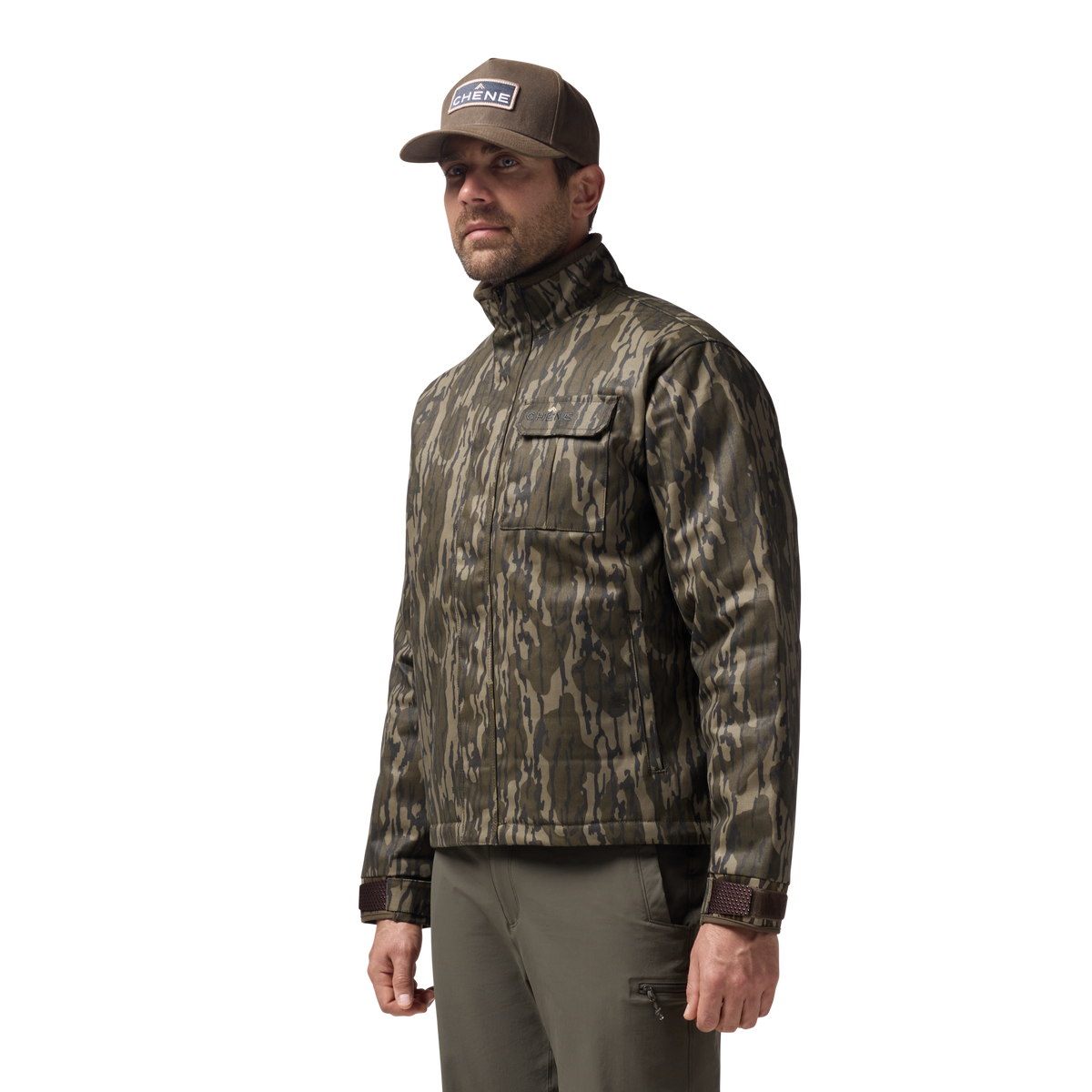 Waxed Canvas Goose Down Jacket in Mossy Oak Original Bottomland, on model #mossy_oak_original_bottomland