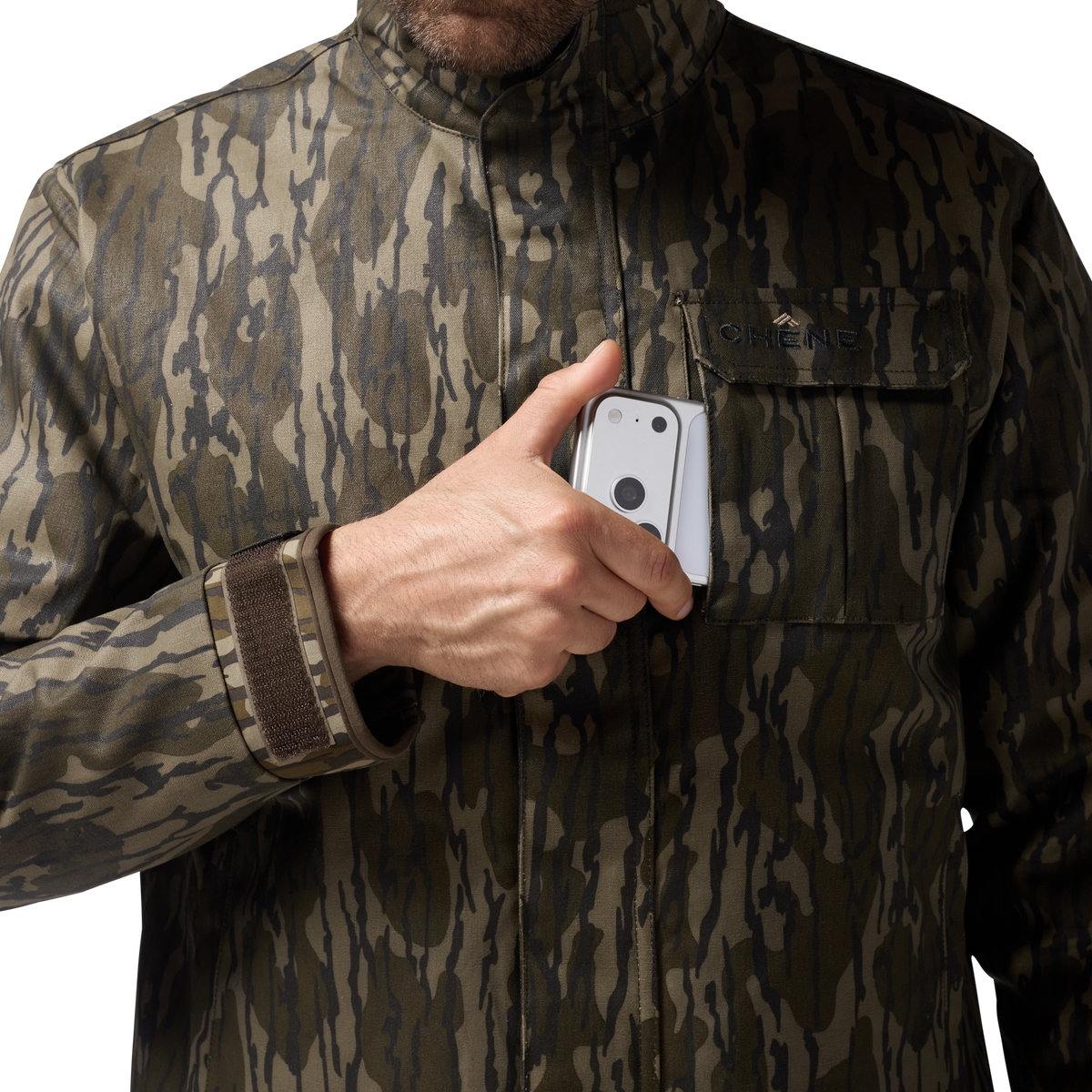 Waxed Canvas Goose Down Jacket in Mossy Oak Original Bottomland, on model #mossy_oak_original_bottomland