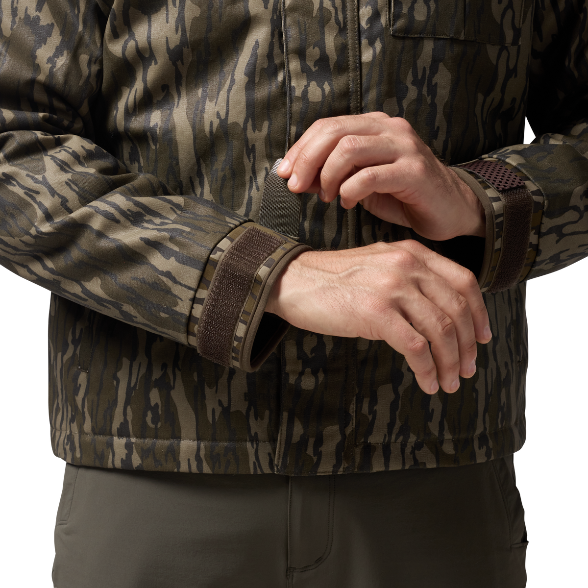 Waxed Canvas Goose Down Jacket in Mossy Oak Original Bottomland, on model #mossy_oak_original_bottomland