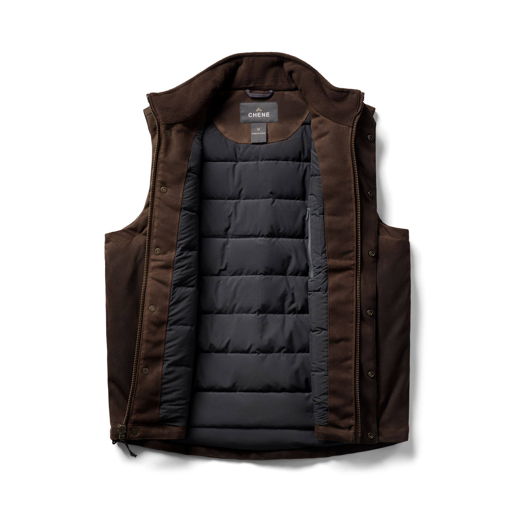 Waxed Canvas Goose Down Vest in Brown, flat lay #brown