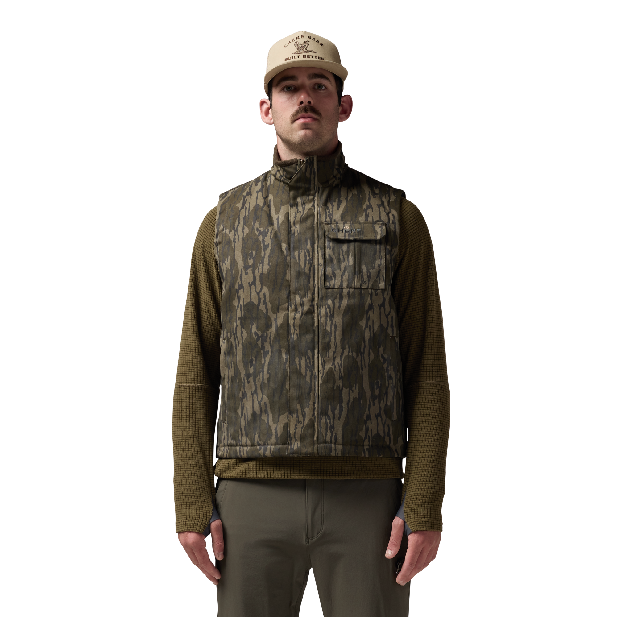 Waxed Canvas Goose Down Vest in Mossy Oak Original Bottomland, on model #mossy_oak_original_bottomland