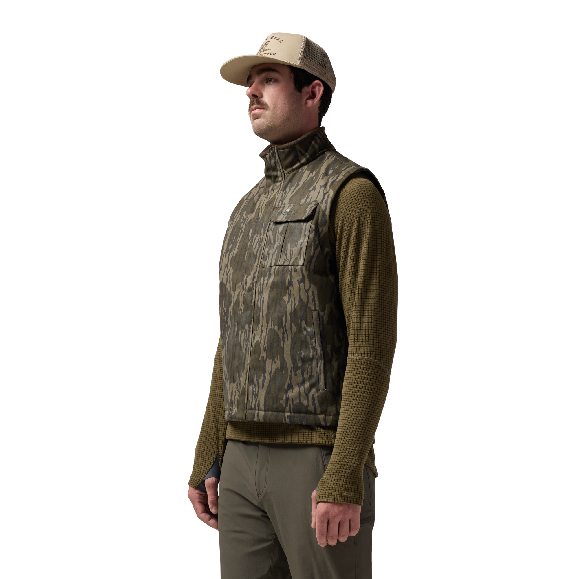 Waxed Canvas Goose Down Vest in Mossy Oak Original Bottomland, on model #mossy_oak_original_bottomland