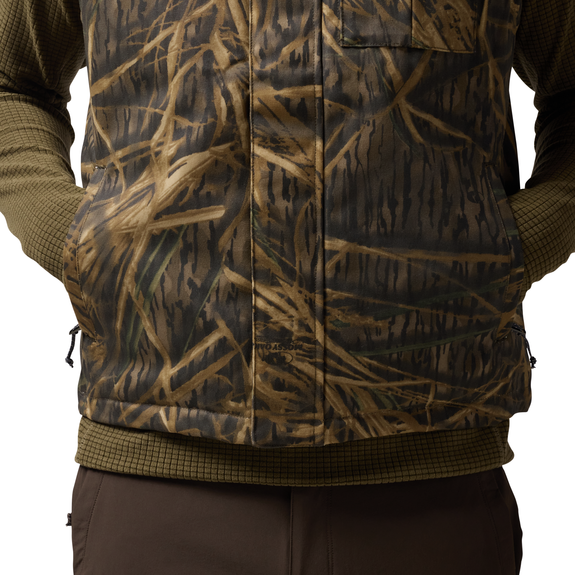 Waxed Canvas Goose Down Vest in Mossy Oak Original Shadow Grass, on model #mossy_oak_original_shadow_grass