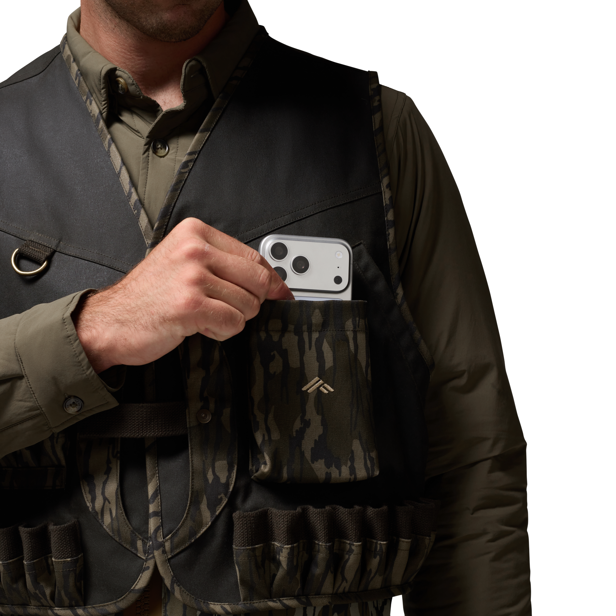 Waxed Canvas Wading Vest in Olive / Mossy Oak Original Bottomland, on model #olive_/_mossy_oak_original_bottomland