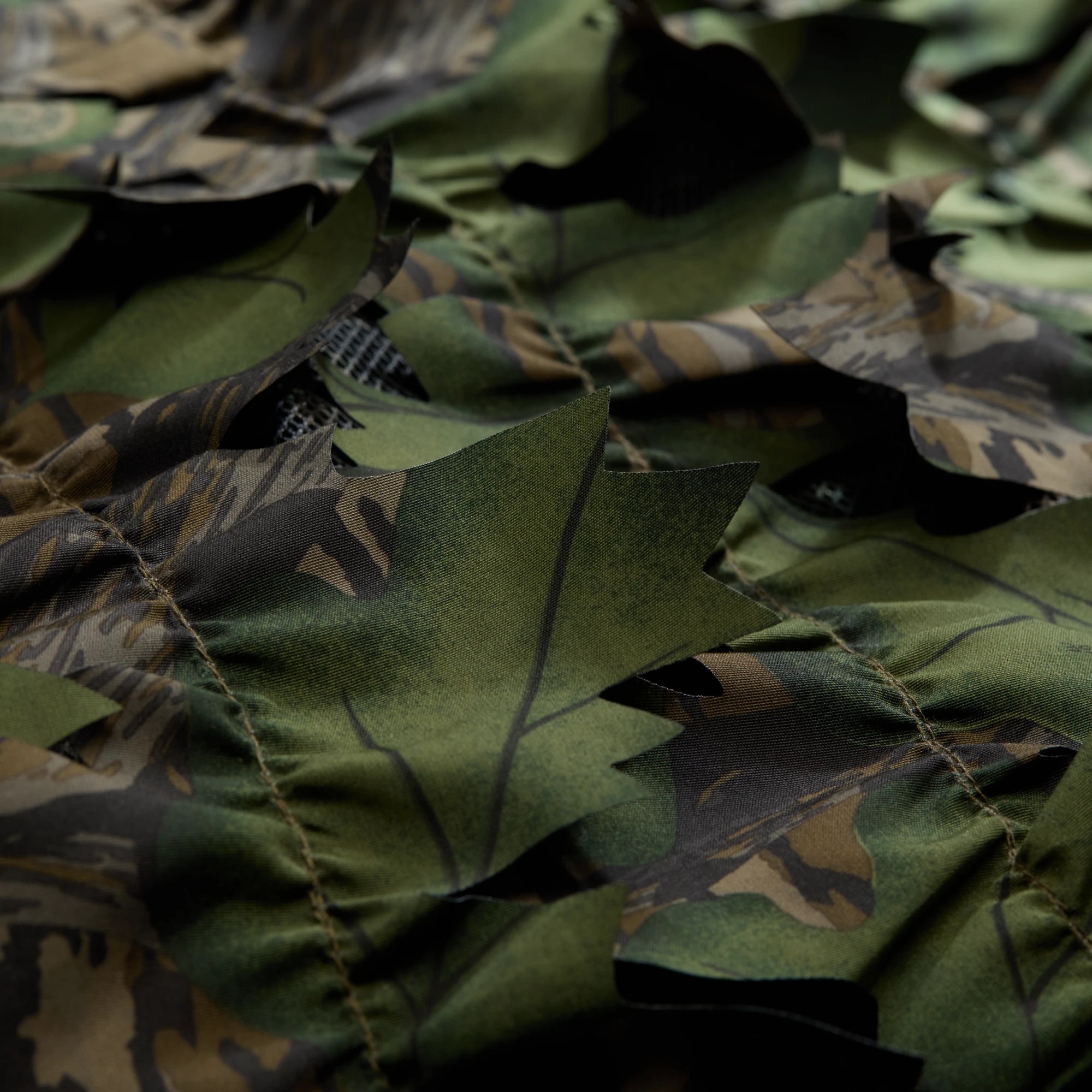 Deception Leafy Jacket in Mossy Oak Full Foliage, fabric detail #mossy_oak_full_foliage