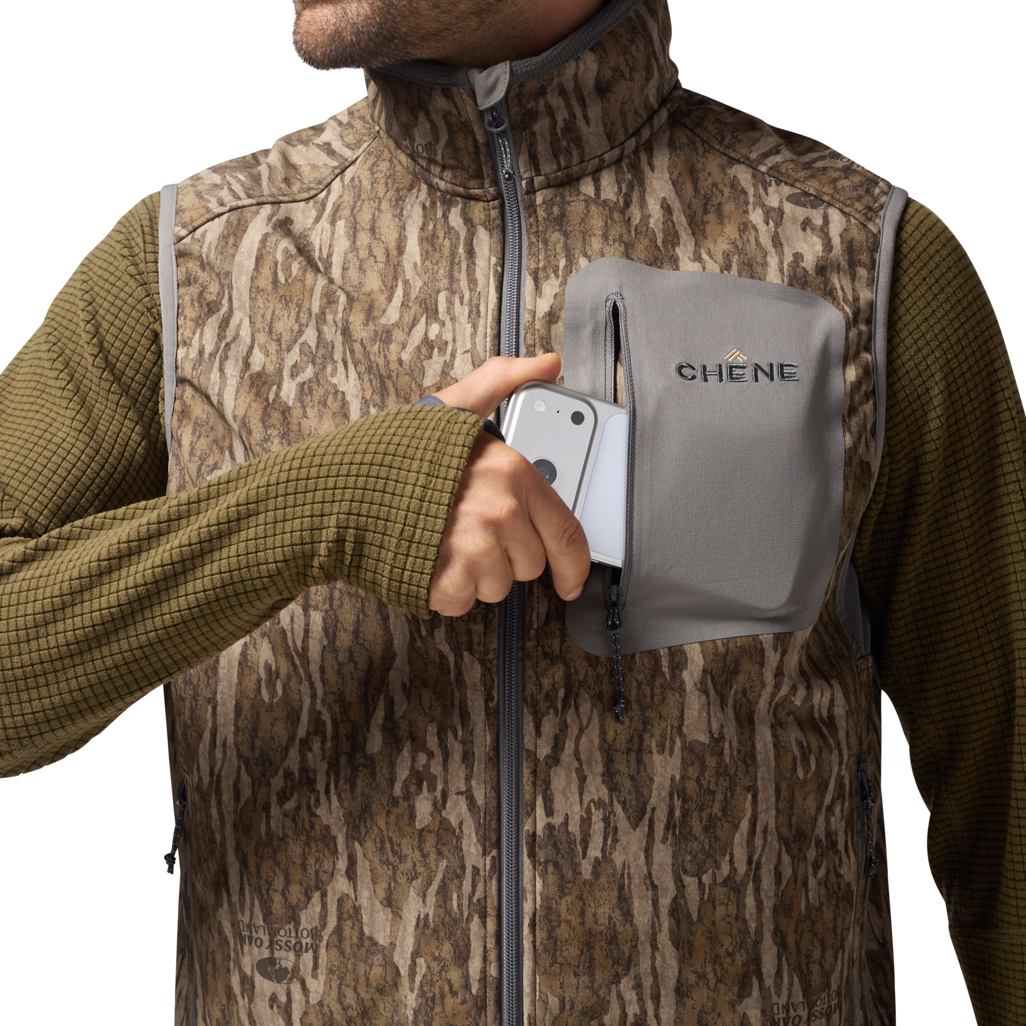 Scout Vest in Mossy Oak Bottomland, on model #mossy_oak_bottomland