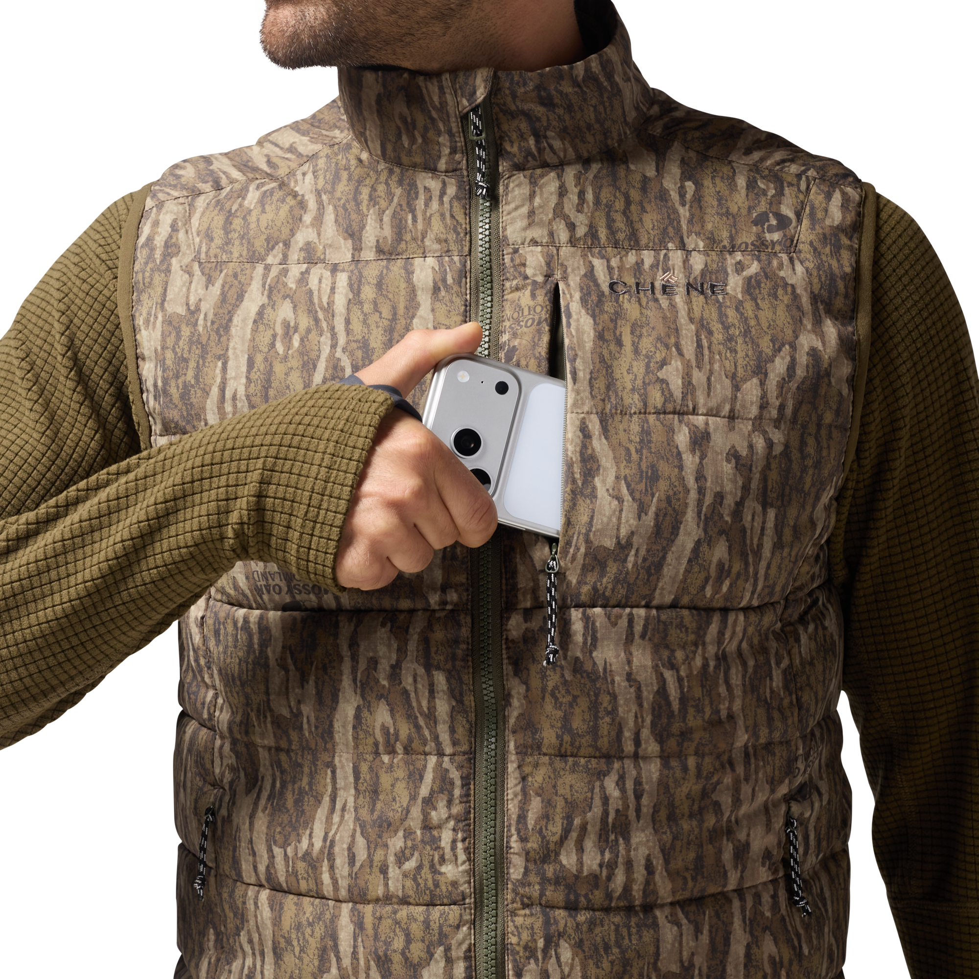 Flyweigh Vest in Mossy Oak Bottomland, on model #mossy_oak_bottomland