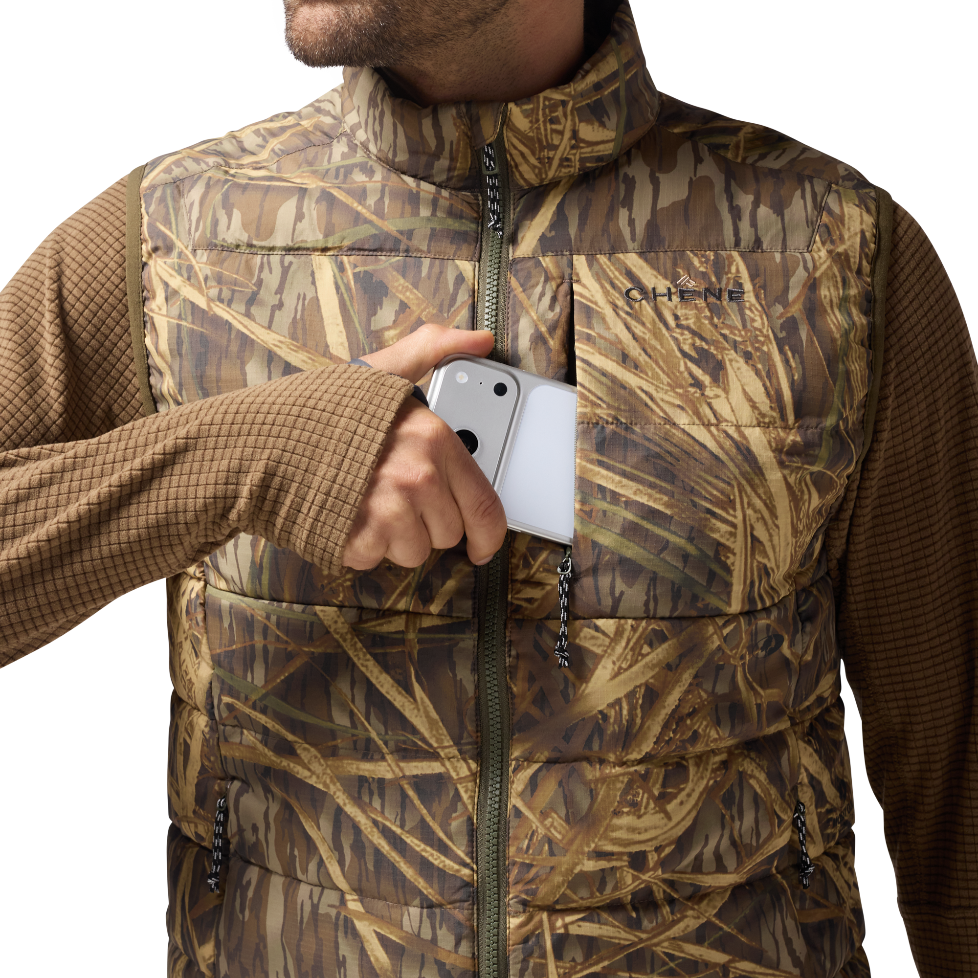 Flyweigh Vest in Mossy Oak Original Shadow Grass, on model #mossy_oak_original_shadow_grass