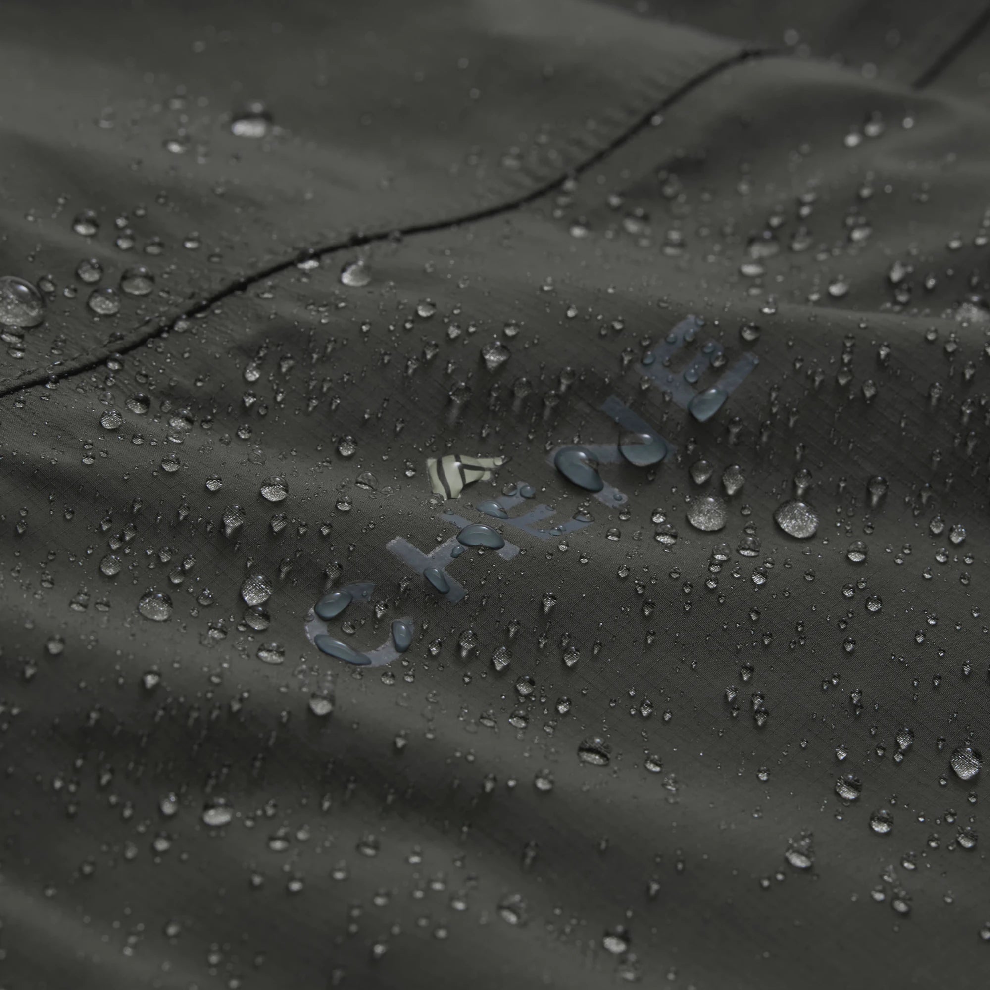 Hydro-Lok Velo Rain Jacket in Cypress, fabric detail #cypress