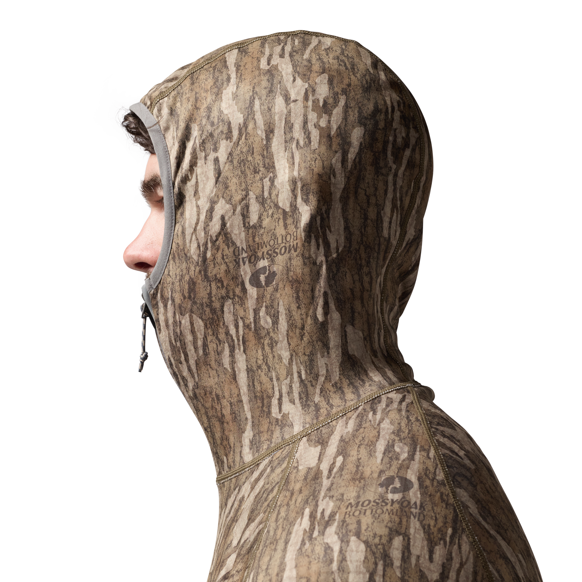 Sixty Series Technical Fleece Half Zip with Hood in Mossy Oak Bottomland, on model #mossy_oak_bottomland
