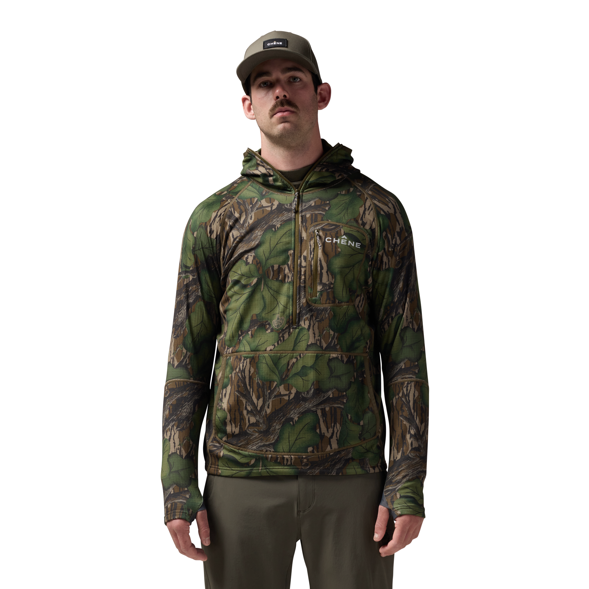 Sixty Series Technical Fleece Half Zip with Hood in Mossy Oak Full Foliage, on model #mossy_oak_full_foliage