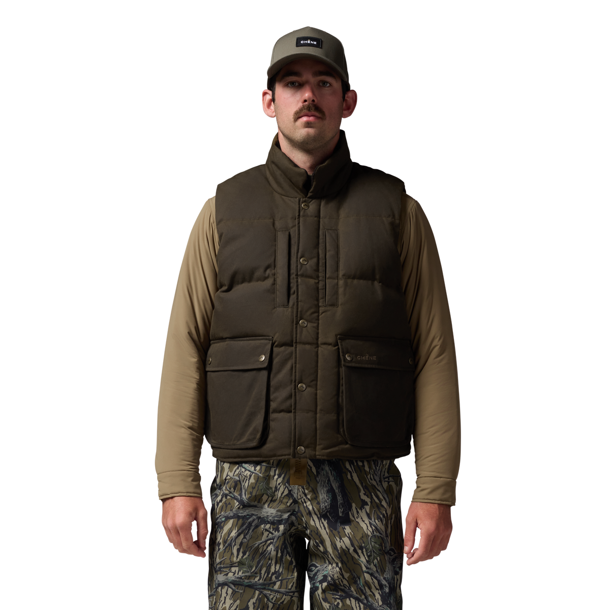 Founder's Reserve Waxed Down Vest in Dark Olive, on model #dark_olive