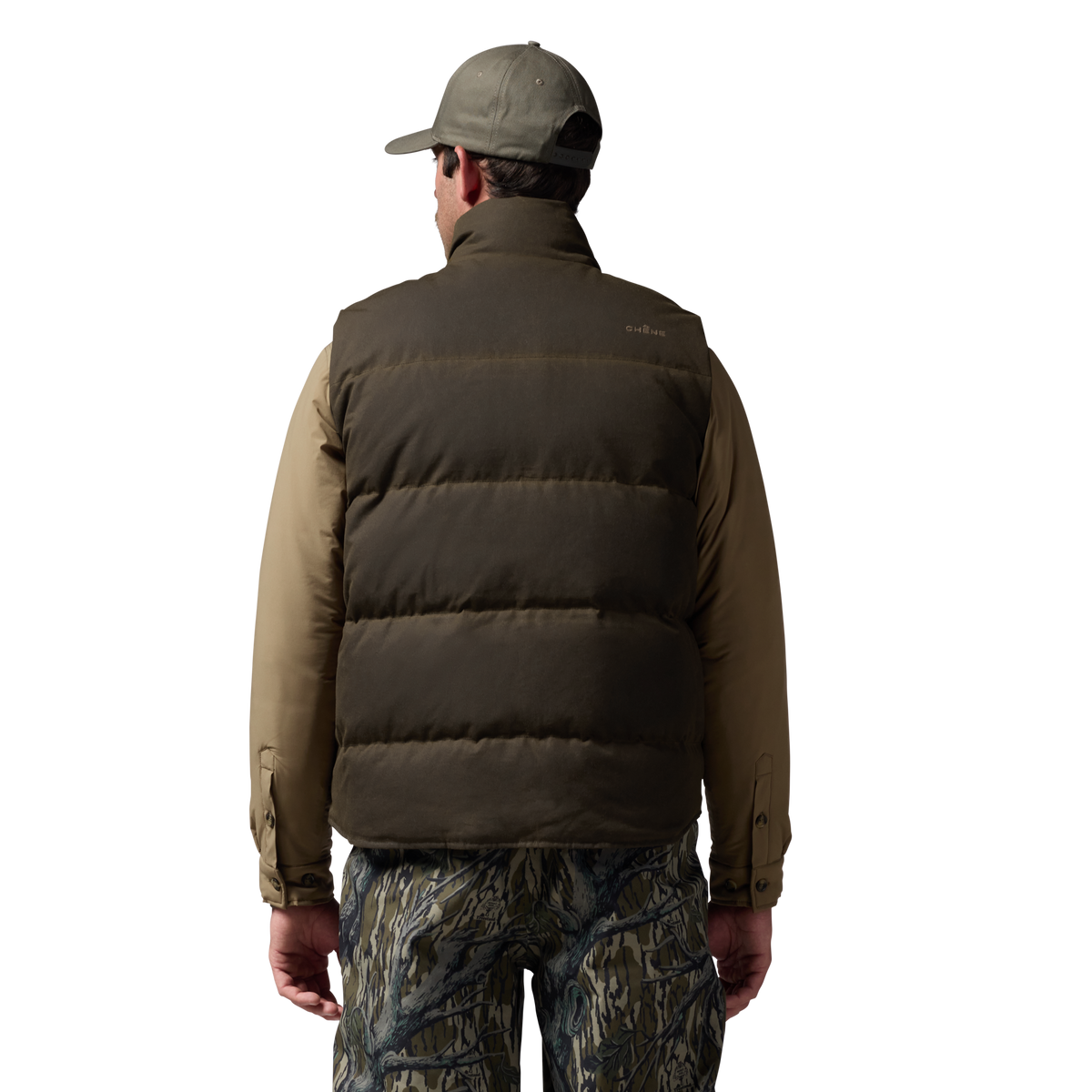 Founder's Reserve Waxed Down Vest in Dark Olive, on model #dark_olive