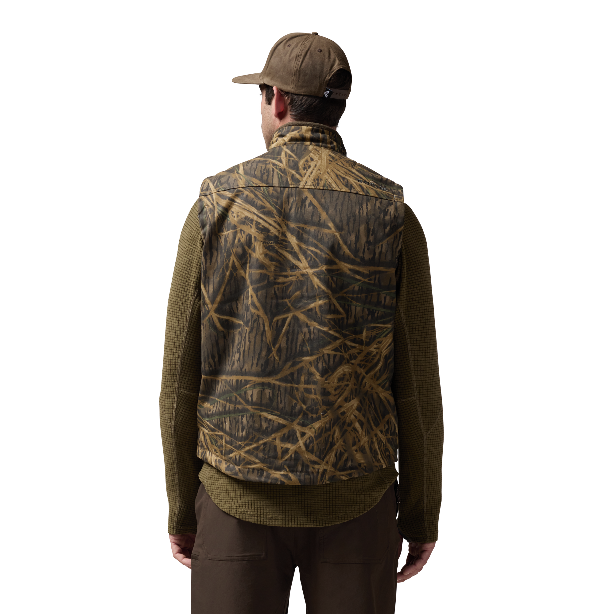 Waxed Canvas Goose Down Vest in Mossy Oak Original Shadow Grass, on model #mossy_oak_original_shadow_grass