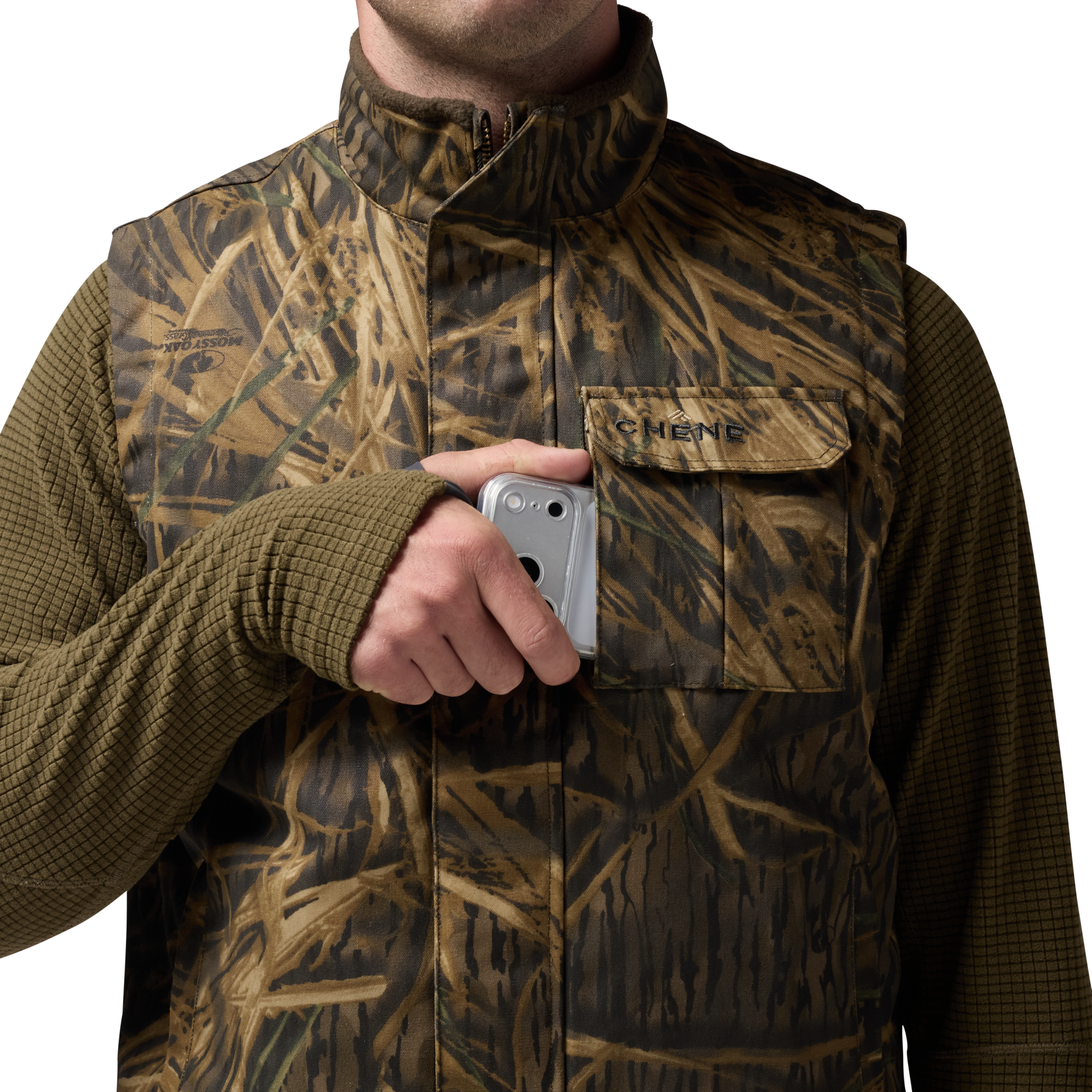 Waxed Canvas Goose Down Vest in Mossy Oak Original Shadow Grass, on model #mossy_oak_original_shadow_grass