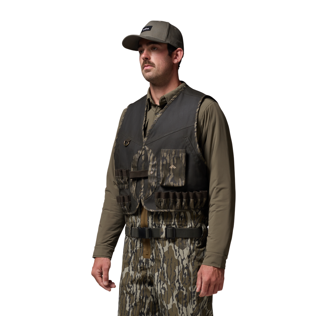 Waxed Canvas Wading Vest in Olive / Mossy Oak Original Bottomland, on model #olive_/_mossy_oak_original_bottomland
