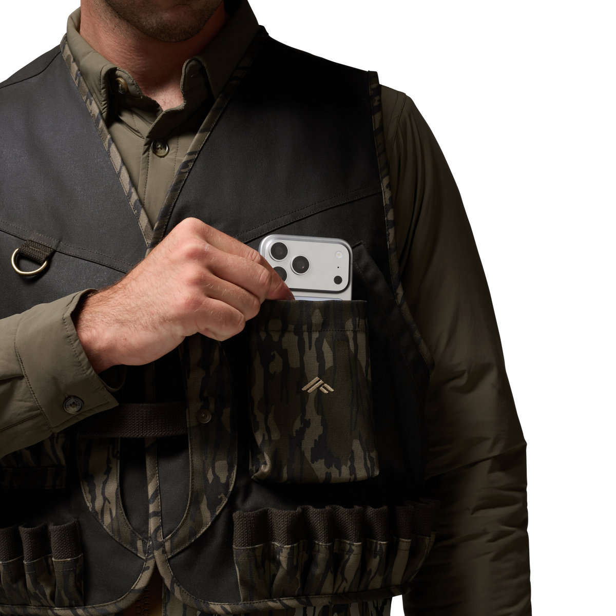 Waxed Canvas Wading Vest in Olive / Mossy Oak Original Bottomland, on model #olive_/_mossy_oak_original_bottomland
