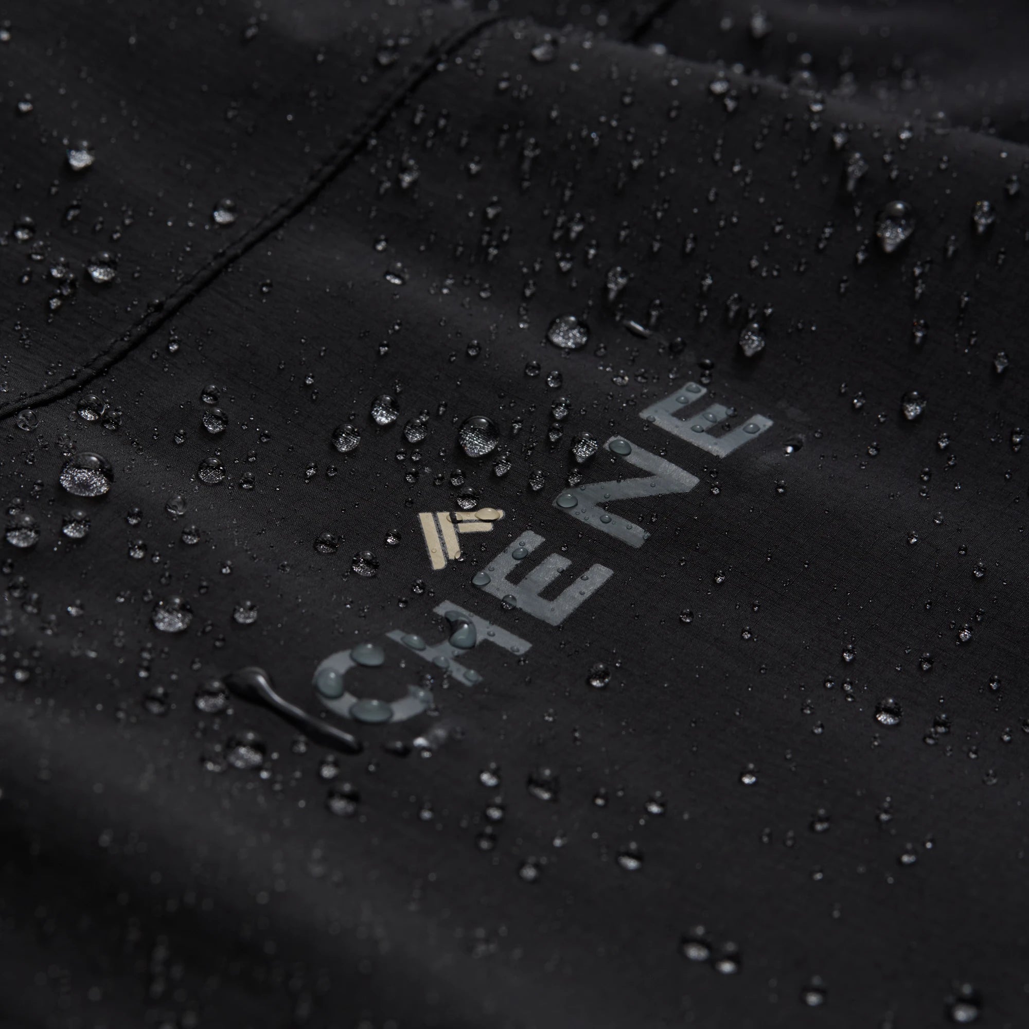 Hydro-Lok Velo Rain Jacket in Black, fabric detail #black