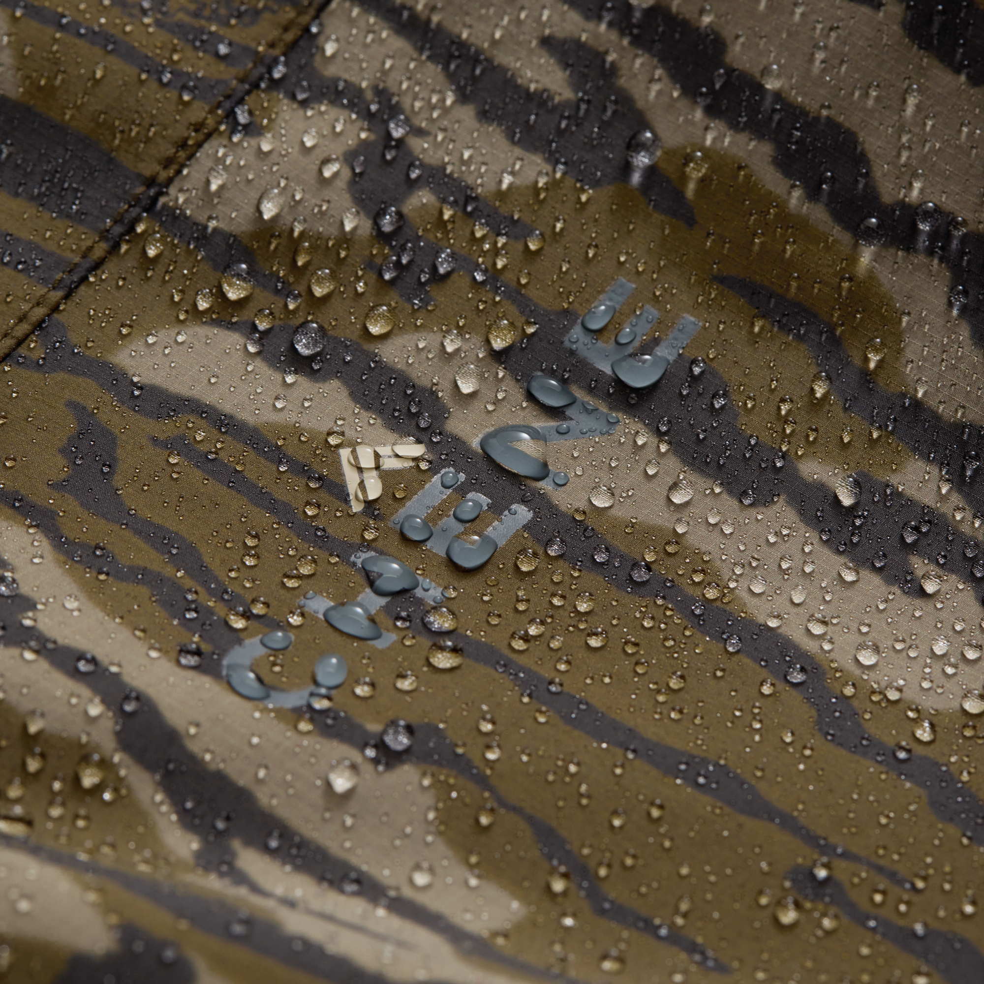 Hydro-Lok Velo Rain Jacket in Mossy Oak Original Bottomland, fabric detail #mossy_oak_original_bottomland